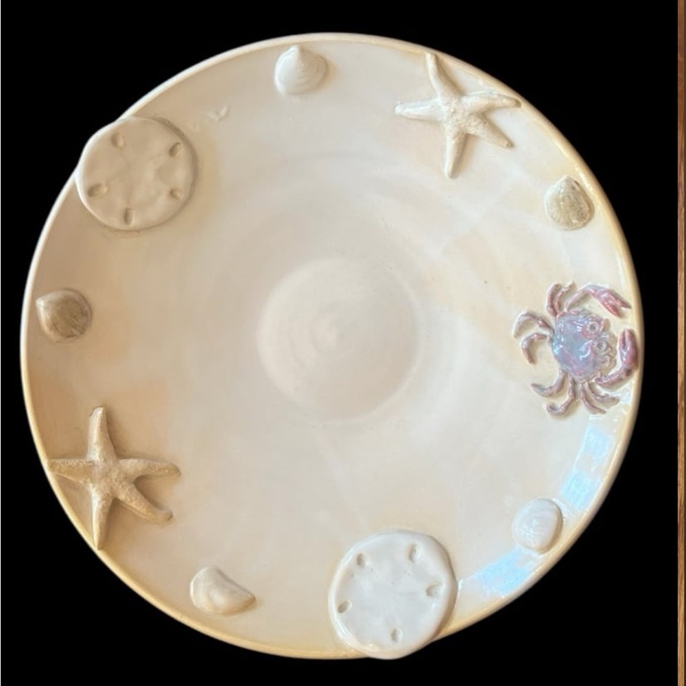 Cream Coastal Themed Plate with crab, seashells and starfish.